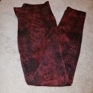 Express red & black stretch snakeskin skinny jeans